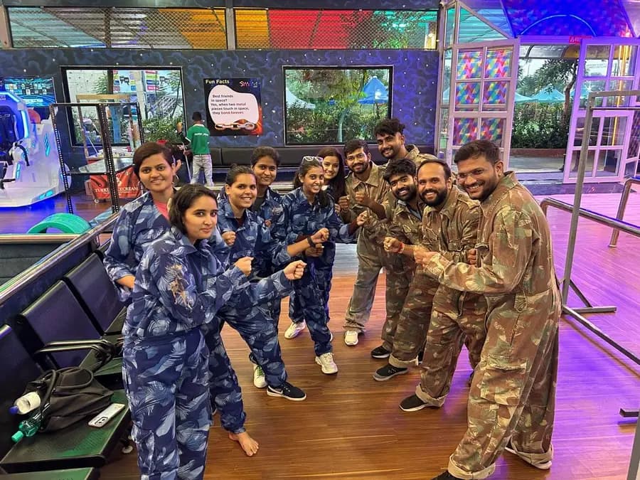 The AppWizards team in overalls at a team outing